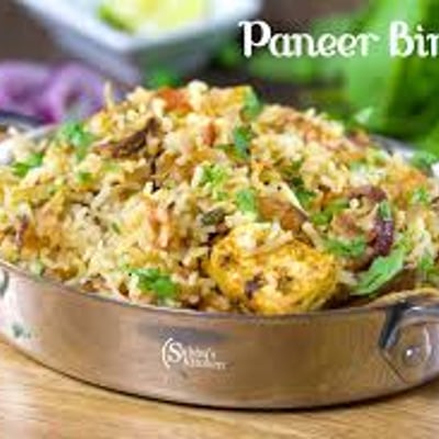 Paneer dum biryani with curd